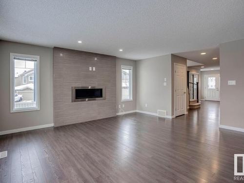 3520 Claxton Crescent, Edmonton, AB - Indoor Photo Showing Living Room With Fireplace