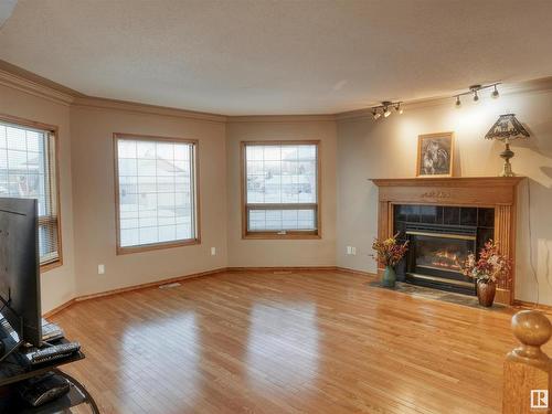 5803 50 Ave, Barrhead, AB - Indoor Photo Showing Living Room With Fireplace