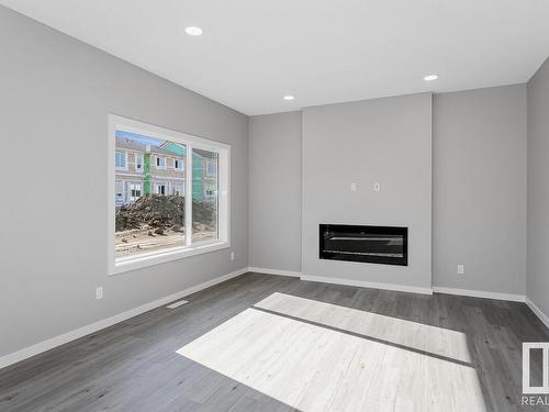 17412 2 Street, Edmonton, AB - Indoor Photo Showing Living Room With Fireplace