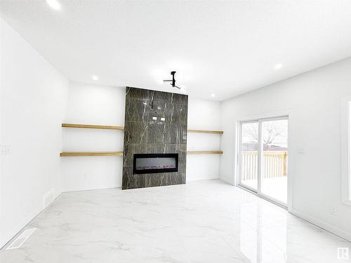 1312 35 Street, Edmonton, AB - Indoor With Fireplace