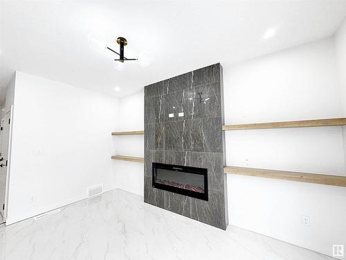 1312 35 Street, Edmonton, AB - Indoor With Fireplace