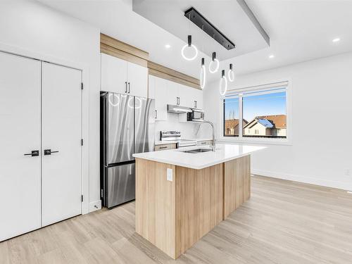 860 Northern Harrier Lane, Edmonton, AB - Indoor Photo Showing Kitchen