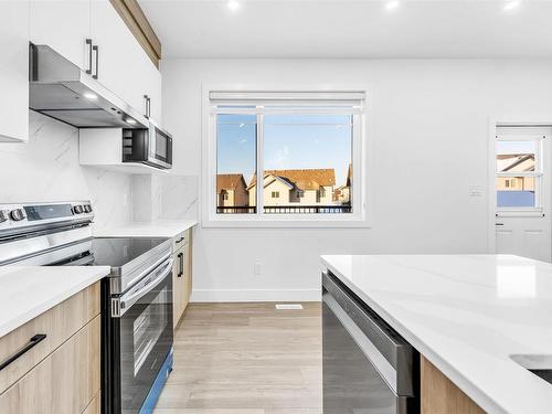 860 Northern Harrier Lane, Edmonton, AB - Indoor Photo Showing Kitchen With Upgraded Kitchen