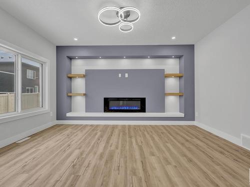 1731 19 Street, Edmonton, AB - Indoor Photo Showing Other Room With Fireplace