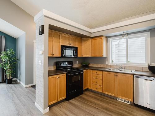 1503 76 Street, Edmonton, AB - Indoor Photo Showing Kitchen With Double Sink