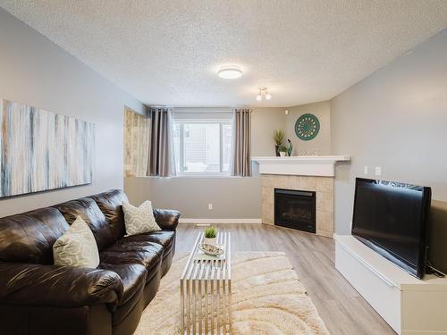 1503 76 Street, Edmonton, AB - Indoor Photo Showing Living Room With Fireplace