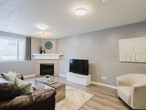 1503 76 Street, Edmonton, AB - Indoor Photo Showing Living Room With Fireplace