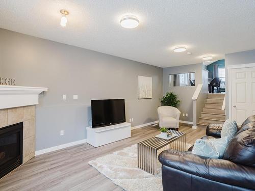 1503 76 Street, Edmonton, AB - Indoor Photo Showing Living Room With Fireplace