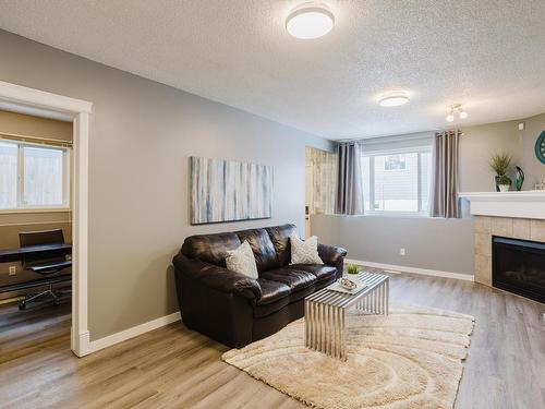 1503 76 Street, Edmonton, AB - Indoor Photo Showing Living Room With Fireplace