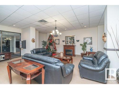 1805 10149 Saskatchewan Drive, Edmonton, AB - Indoor Photo Showing Living Room With Fireplace