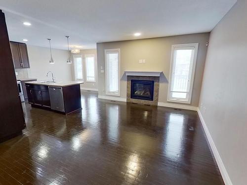 2046 69A Street, Edmonton, AB - Indoor Photo Showing Other Room With Fireplace