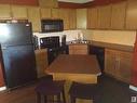 214 646 Mcallister Loop, Edmonton, AB  - Indoor Photo Showing Kitchen With Double Sink 