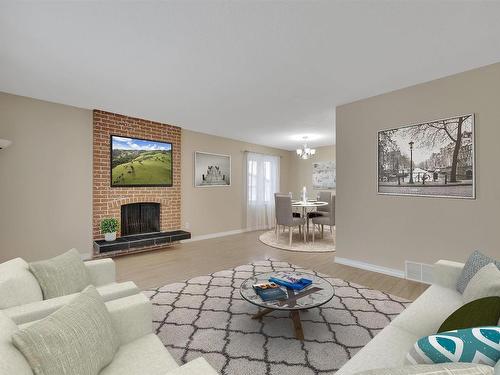 3103 104 Street, Edmonton, AB - Indoor Photo Showing Living Room With Fireplace