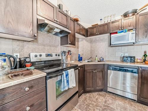 5418 7335 South Terwillegar Drive, Edmonton, AB - Indoor Photo Showing Kitchen With Double Sink