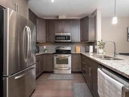 6079 Maynard Way, Edmonton, AB - Indoor Photo Showing Kitchen With Stainless Steel Kitchen With Double Sink