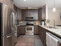 6079 Maynard Way, Edmonton, AB  - Indoor Photo Showing Kitchen With Stainless Steel Kitchen With Double Sink 