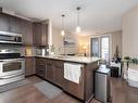 #347 6079 Maynard Way, Edmonton, AB  - Indoor Photo Showing Kitchen 