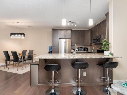 #347 6079 Maynard Way, Edmonton, AB - Indoor Photo Showing Kitchen With Stainless Steel Kitchen With Upgraded Kitchen