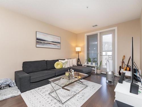 #347 6079 Maynard Way, Edmonton, AB - Indoor Photo Showing Living Room