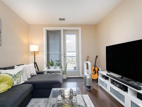 #347 6079 Maynard Way, Edmonton, AB - Indoor Photo Showing Living Room