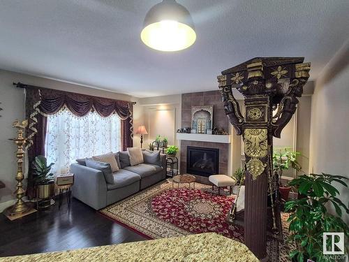 1873 32A Street, Edmonton, AB - Indoor Photo Showing Living Room With Fireplace