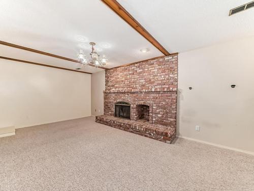 3221 112C Street, Edmonton, AB - Indoor Photo Showing Other Room With Fireplace