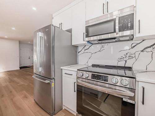 Edmonton, AB - Indoor Photo Showing Kitchen