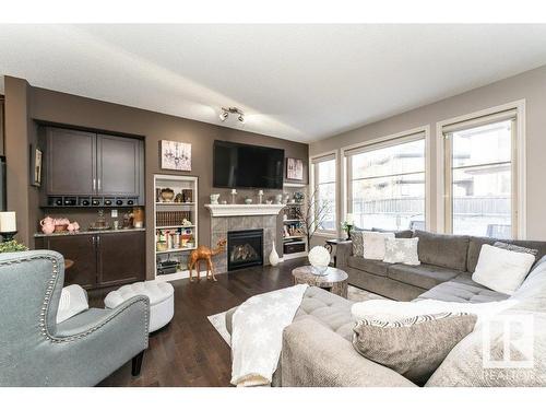 1062 Armitage Crescent, Edmonton, AB - Indoor Photo Showing Living Room With Fireplace