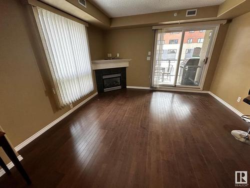 506 9707 106 Street, Edmonton, AB - Indoor With Fireplace