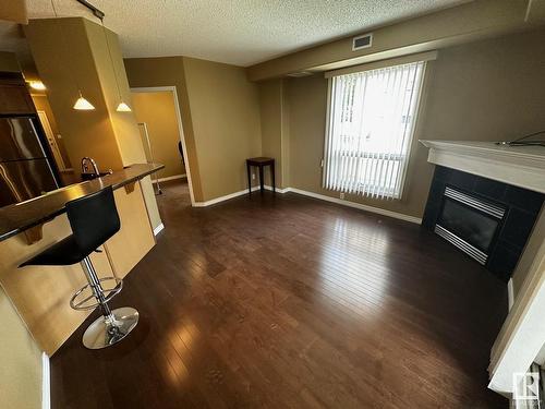 506 9707 106 Street, Edmonton, AB - Indoor With Fireplace