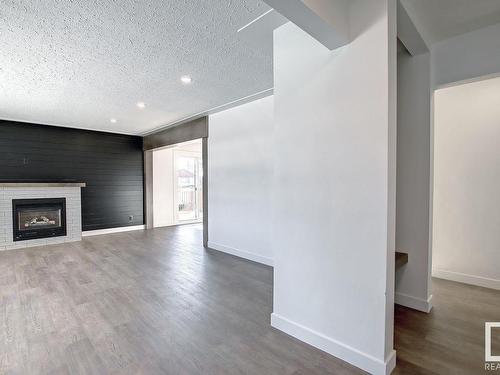 9104 69 Street, Edmonton, AB - Indoor Photo Showing Other Room With Fireplace