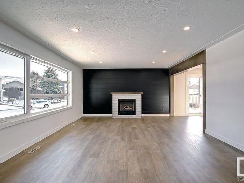 9104 69 Street, Edmonton, AB - Indoor Photo Showing Living Room With Fireplace