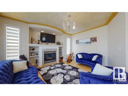 16627 70 Street, Edmonton, AB - Indoor Photo Showing Living Room With Fireplace