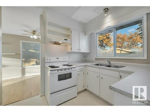 4111 44 Street, Leduc, AB - Indoor Photo Showing Kitchen With Double Sink