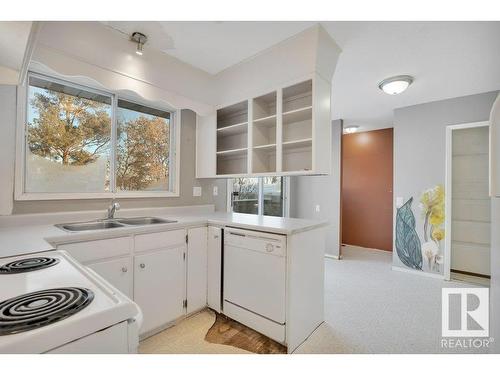 4111 44 Street, Leduc, AB - Indoor Photo Showing Kitchen With Double Sink