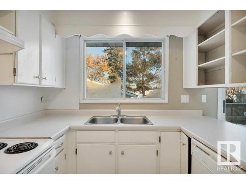 4111 44 Street, Leduc, AB - Indoor Photo Showing Kitchen With Double Sink