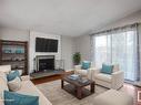 11940 152B Avenue, Edmonton, AB  - Indoor Photo Showing Living Room With Fireplace 