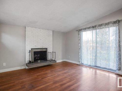 11940 152B Avenue, Edmonton, AB - Indoor Photo Showing Living Room With Fireplace