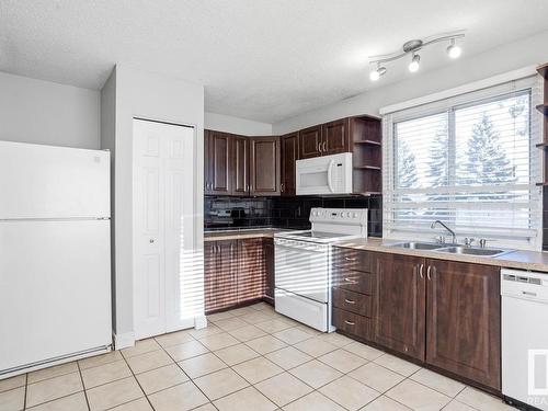 11940 152B Avenue, Edmonton, AB - Indoor Photo Showing Kitchen With Double Sink