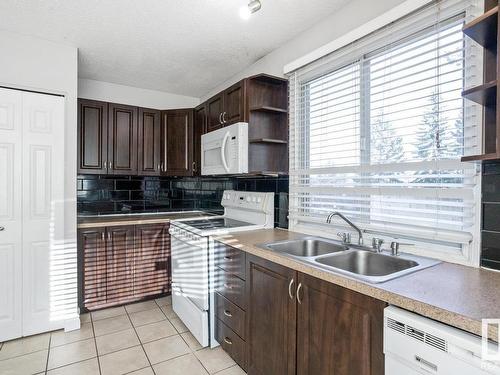 11940 152B Avenue, Edmonton, AB - Indoor Photo Showing Kitchen With Double Sink