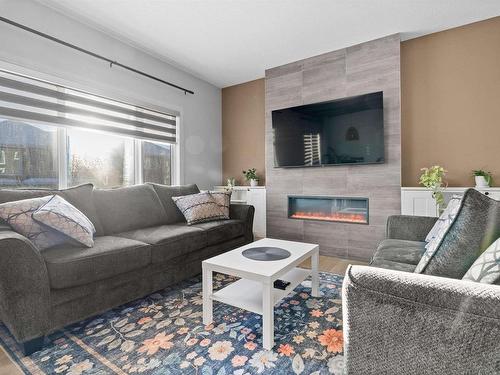 3874 Robins Crescent, Edmonton, AB - Indoor Photo Showing Living Room With Fireplace