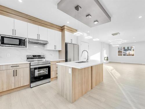 822 Northern Harrier Lane, Edmonton, AB - Indoor Photo Showing Kitchen With Upgraded Kitchen