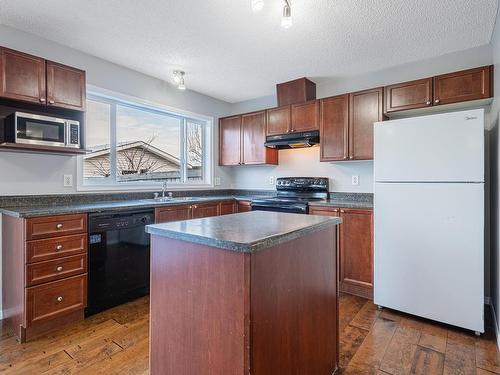 20232 57 Avenue, Edmonton, AB - Indoor Photo Showing Kitchen