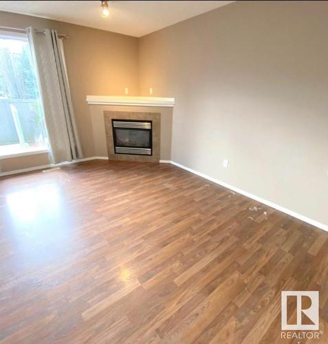 380 Silver Berry Road, Edmonton, AB - Indoor Photo Showing Living Room With Fireplace