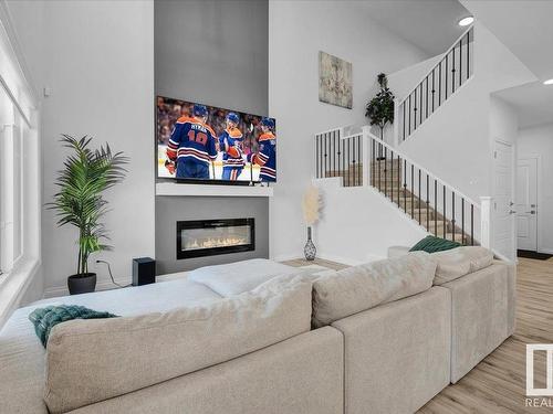 8888 Carson Way, Edmonton, AB - Indoor Photo Showing Living Room With Fireplace