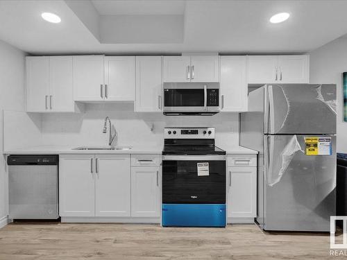 8888 Carson Way, Edmonton, AB - Indoor Photo Showing Kitchen With Double Sink