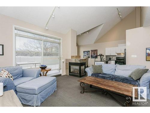 10219 111 Street, Edmonton, AB - Indoor Photo Showing Living Room With Fireplace