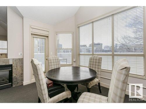 10219 111 Street, Edmonton, AB - Indoor Photo Showing Dining Room With Fireplace