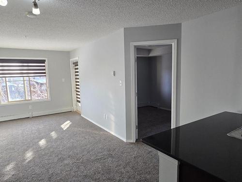 210 1080 Mcconachie Boulevard W, Edmonton, AB - Indoor Photo Showing Other Room