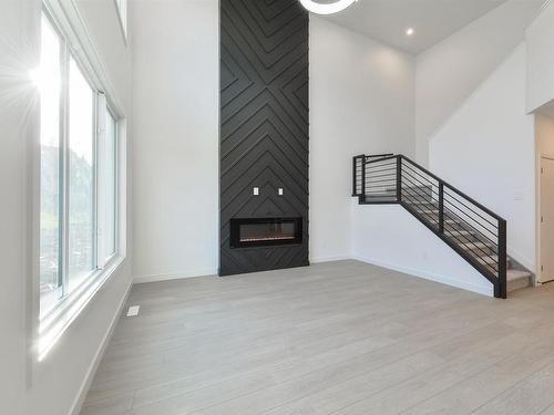 1164 Gyrfalcon Crescent, Edmonton, AB - Indoor With Fireplace